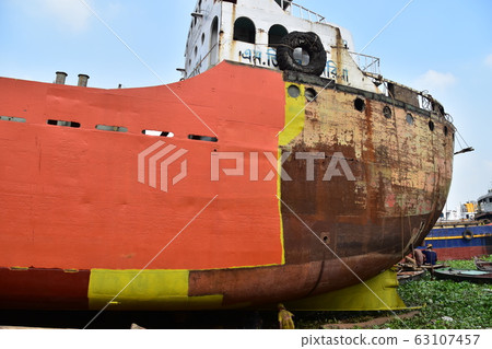 Dhaka, Bangladesh Retro shipyard along the Brigonga River Workers repairing old ships Silently working 63107457