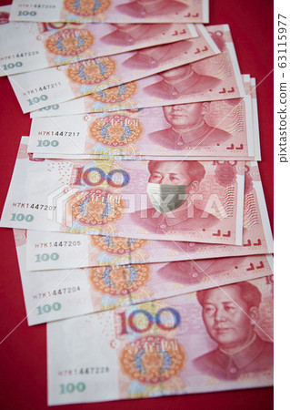 Chinese yuan with mask Corona shock world economic image Chinese yuan with mask Corona shock world economic image 63115977