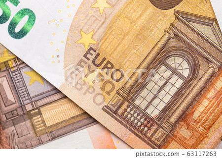 Euro money closeup isolated background. Euro money closeup isolated background. 63117263