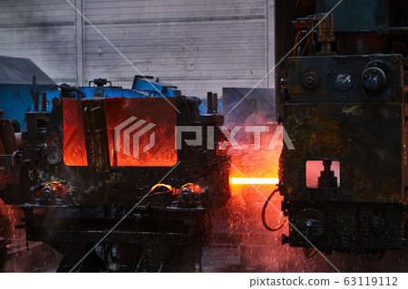 Hot square steel bloom on the roll-table Hot square steel bloom on the roll-table 63119112