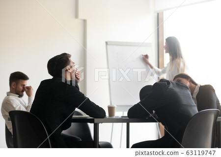 Bored unmotivated diverse team of employees feeling lack of interest. 63119747