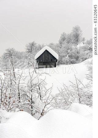 Minimalistic winter landscape with wooden house Minimalistic winter landscape with wooden house 63120645