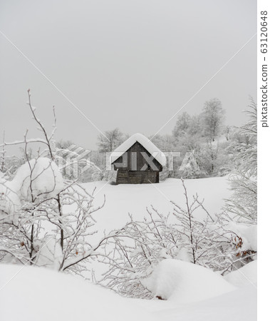 Minimalistic winter landscape with wooden house Minimalistic winter landscape with wooden house 63120648