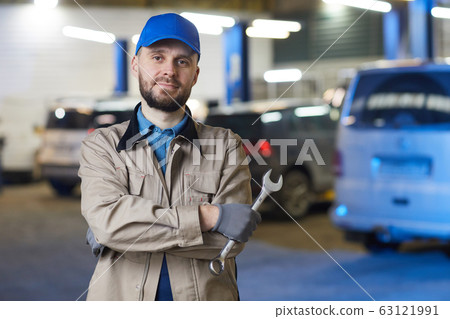 Auto Mechanic With Spanner 63121991