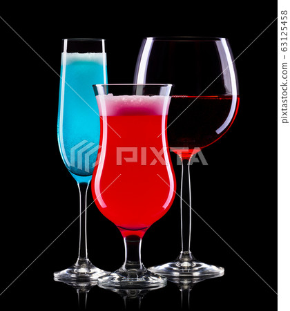 Set of different cocktail glasses for drinks on black background Set of different cocktail glasses for drinks on black background 63125458