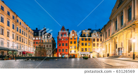 Stockholm, Sweden. Famous Old Colorful Houses, Swedish Academy and Nobel Museum In Old Square Stortorget In Gamla Stan. Famous Landmarks And Popular Place. Panorama. Stockholm, Sweden. Famous Old Colorful Houses, Swedish Academy and Nobel Museum In Old Square Stortorget In Gamla Stan. Famous Landmarks And Popular Place. Panorama. 63126569