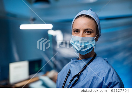 Doctor in hospital looking at camera, coronavirus concept. 63127704