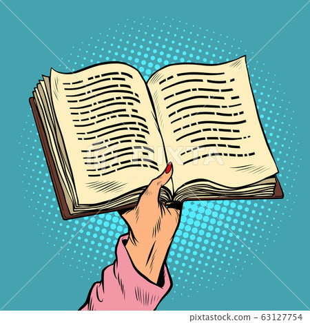 An open book in his hand. Reading and knowledge An open book in his hand. Reading and knowledge 63127754