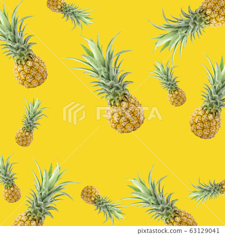 Pineapple pattern on yellow background Pineapple pattern on yellow background 63129041