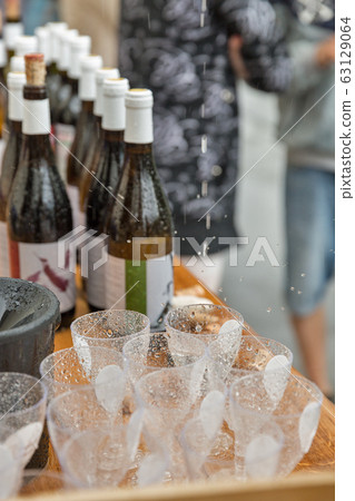 Wine tasting under the rain 63129064