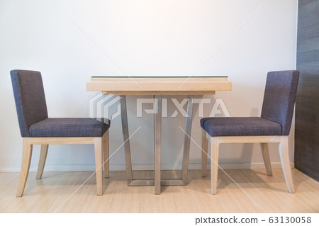 Chair and table in living room. Chair and table in living room. 63130058