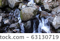 Winter mountain running water 63130719