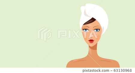 young woman with towel wrapped around her head beautiful girl looking at camera horizontal portrait 63130968