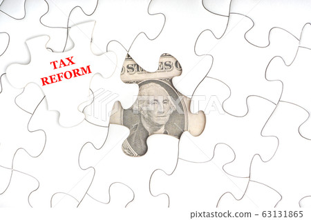TAX REFORM text with Dollar banknotes on white 63131865