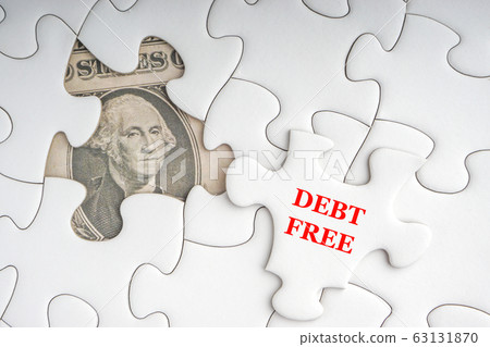 DEBT FREE text with Dollar banknotes on white DEBT FREE text with Dollar banknotes on white 63131870