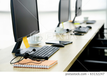 Chairs computers and headset call center in modern Chairs computers and headset call center in modern 63132247