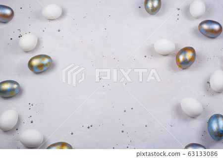 Easter layout with colored eggs on minimal gray Easter layout with colored eggs on minimal gray 63133086