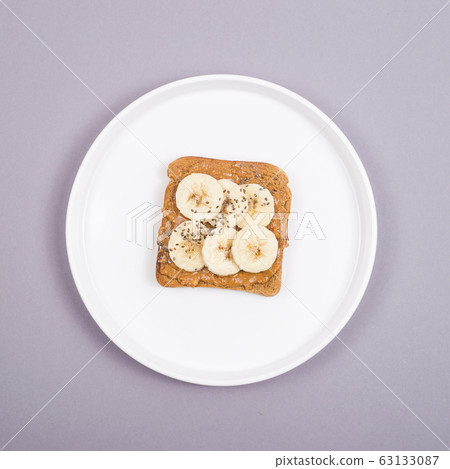Healthy vegetarian breakfast with peanut butter, 63133087