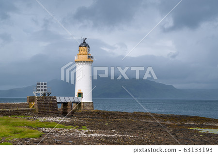 Tobermory Lighthouse and foggy view to other islands of Hebrides archipelago Tobermory Lighthouse and foggy view to other islands of Hebrides archipelago 63133193
