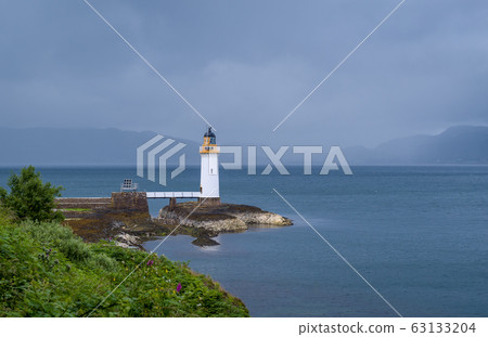 Nothern sea at cloudy weather and Tobermory Lighthouse 63133204
