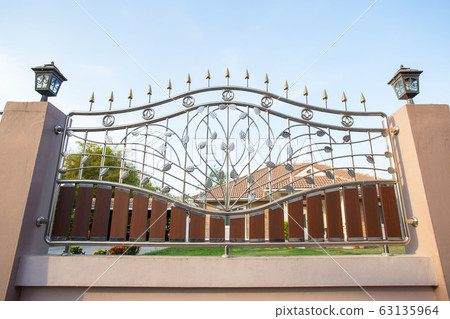 Stainless steel fence on the wall. 63135964