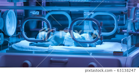 Newborn receiving jaundice treatment Newborn receiving jaundice treatment 63138247