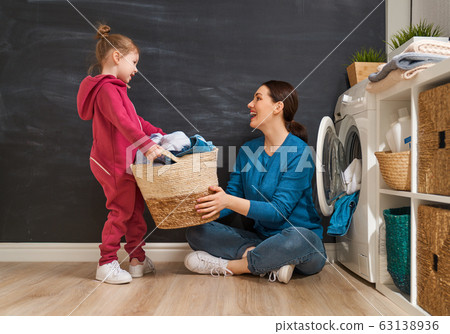 family doing laundry 63138936