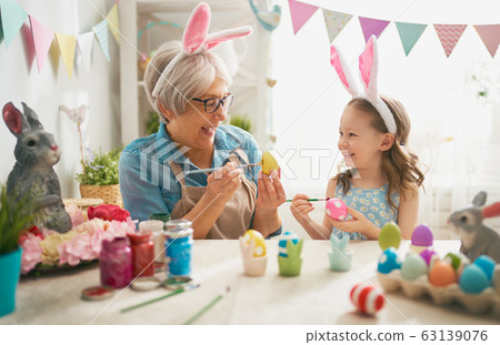 family preparing for Easter family preparing for Easter 63139076