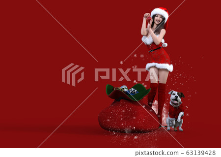 Smiling Japanese young woman and dog wearing Christmas costumes and posing next to gift bag 63139428