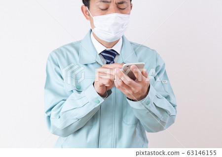 Men in work clothes Men in work clothes 63146155