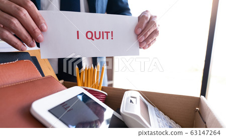 Businessman holding with I quit words card letter, Businessman holding with I quit words card letter, 63147264