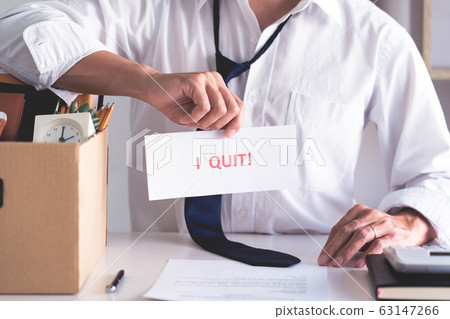 Businessman holding with I quit words card letter, Businessman holding with I quit words card letter, 63147266