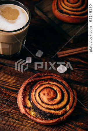 Sweet roll with poppy seeds Sweet roll with poppy seeds 63149180