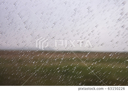 Rainy day outside the window 63150226