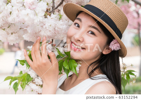 beautiful girl and cherry blossom beautiful girl and cherry blossom 63152294