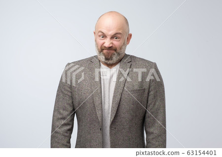 Angry caucasian man being furious losing his temper. 63154401