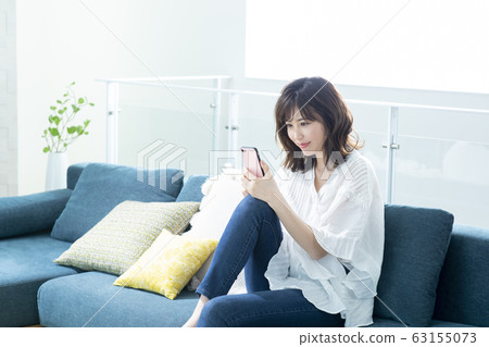 Young lady · Smartphone Young lady · Smartphone 63155073