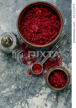 Heap of saffron threads Heap of saffron threads 63155975