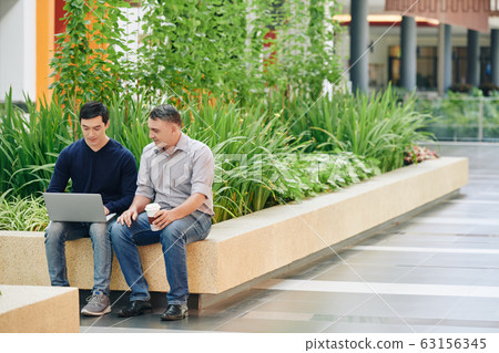 Programmer asking colleague for help 63156345