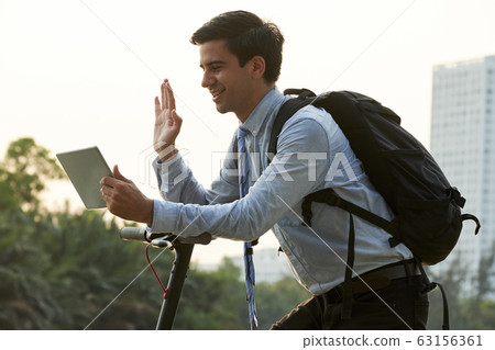 Video calling businessman 63156361