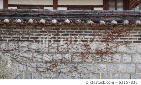 Stacking style of Korean traditional architecture with brown ivy Stacking style of Korean traditional architecture with brown ivy 63157833