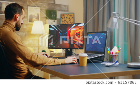 Young game creator testing the interface 63157863