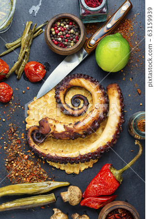Grilled octopus on cheese waffle Grilled octopus on cheese waffle 63159939