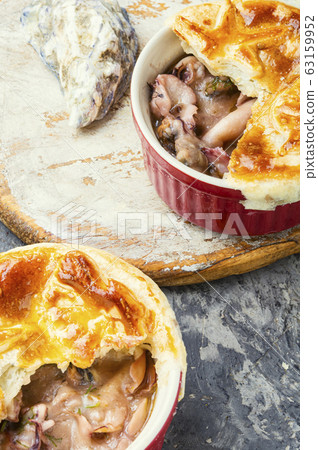 Seafood soup or julienne. 63159952