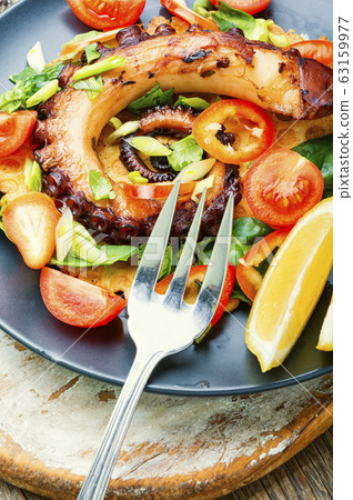 Vegetable salad with octopus. 63159977