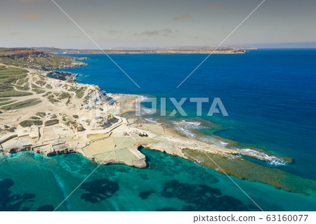 Aerial view of Salt pans in the Island of Malta Aerial view of Salt pans in the Island of Malta 63160077