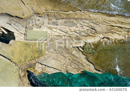 Aerial view of Salt pans in the Island of Malta Aerial view of Salt pans in the Island of Malta 63160078