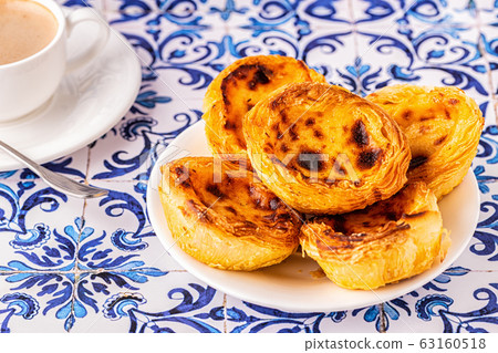 Egg tart, traditional Portuguese dessert, pastel Egg tart, traditional Portuguese dessert, pastel 63160518