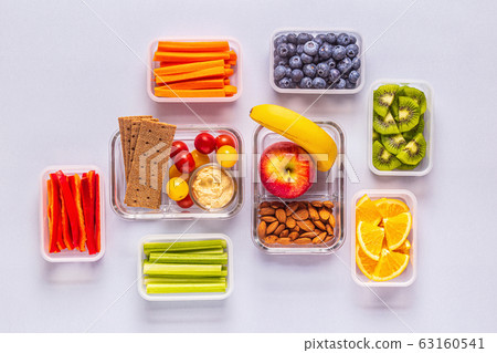 Healthy snack on a pastel background. Healthy snack on a pastel background. 63160541