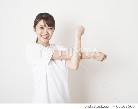 Women stretching Women stretching 63162566